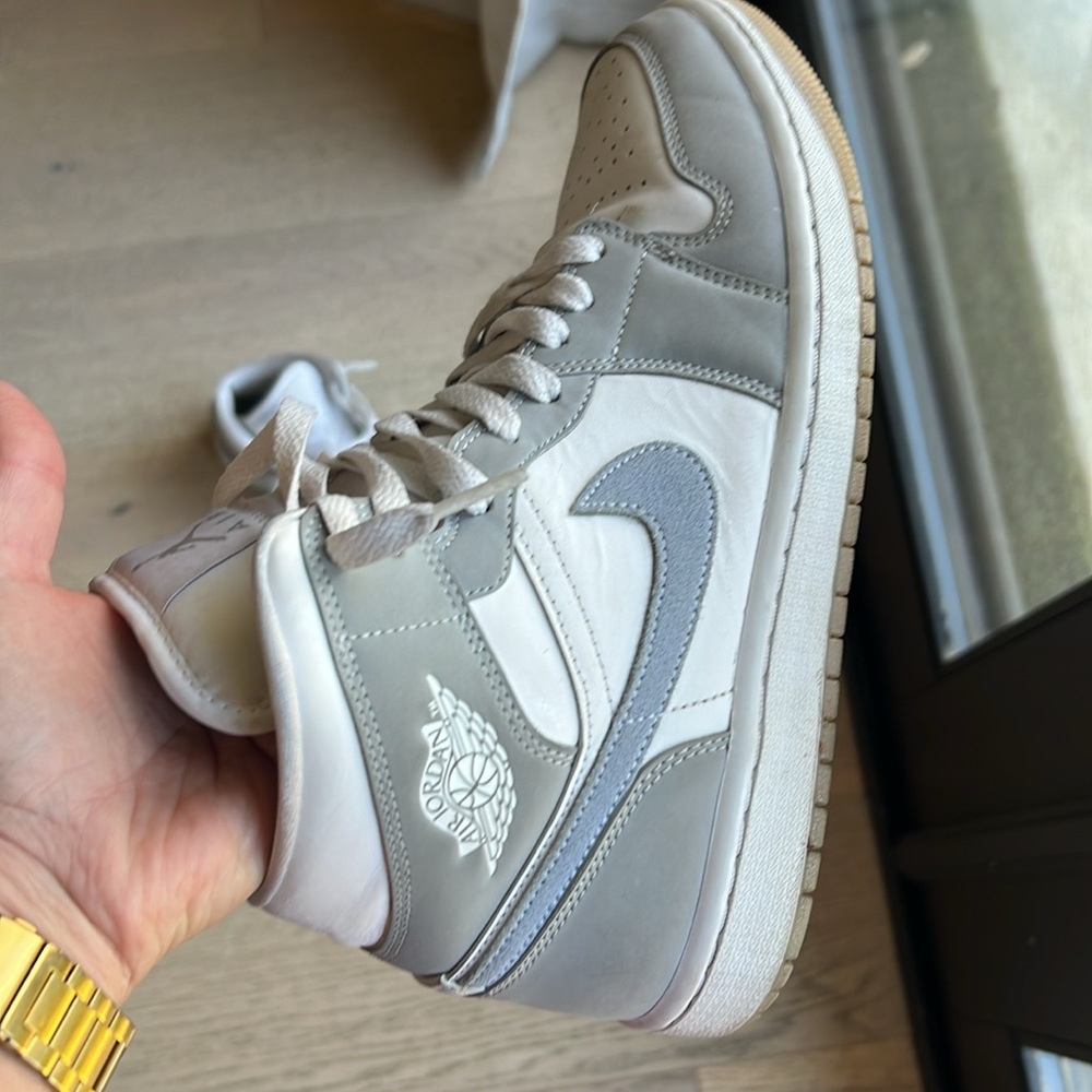 Women’s Nike Jordan’s 9.5 grey and white with blue swoosh